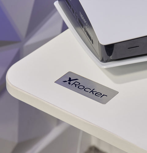 Streamlined white adjustable desk with monitor and laptop