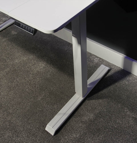 Compact standing desk in white for remote work setup