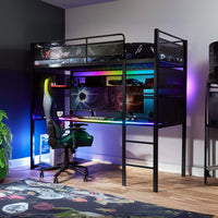 Gaming room setup with a high chair, desk, and computer setup.