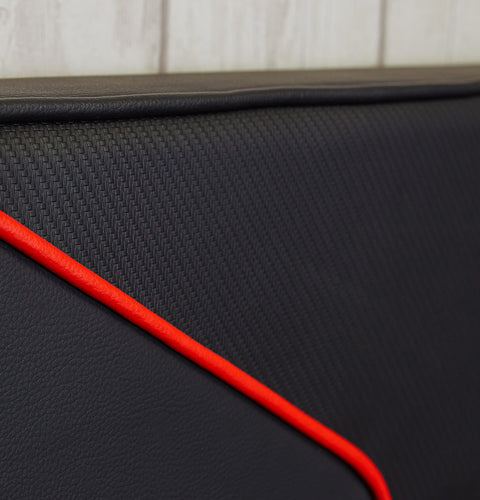 Close up of the x rocker cerberus MK11 Gaming Bed headboard in carbon red featuring a padded upholstered design for extra comfort.