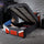 Red gaming bed with ottoman storage X Rocker cerberus MK11 provides comfort durability and space saving design.
