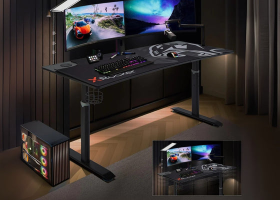 Gaming desk setup with dual monitors, keyboard, and mouse in a dark room.