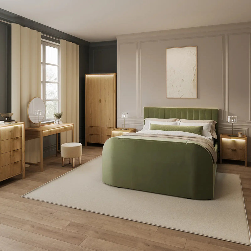 Modern bedroom with green bed and wooden furniture