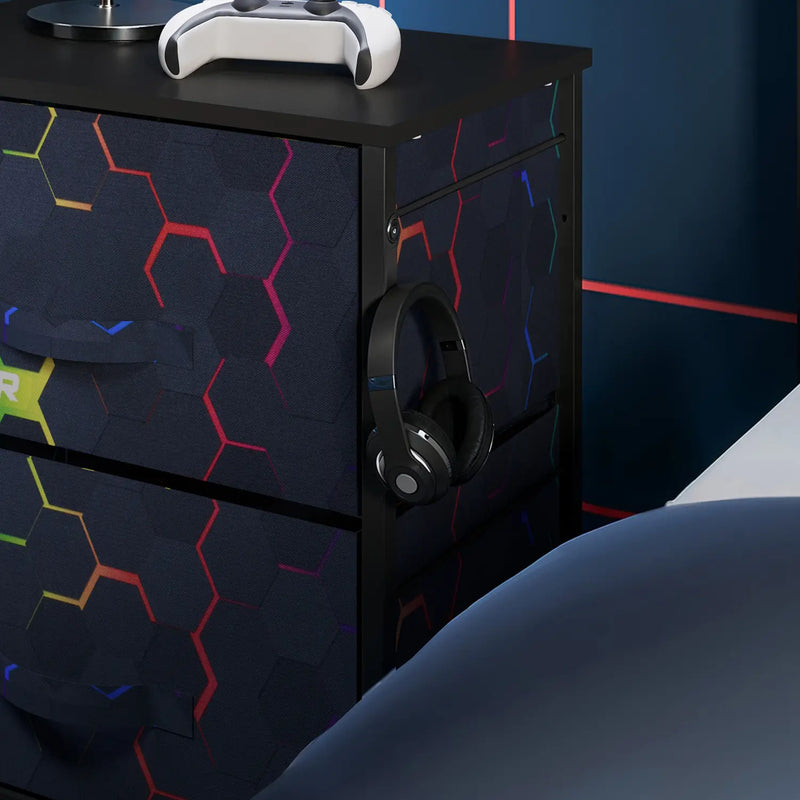 Canvas dresser with colorful geometric pattern next to a bed