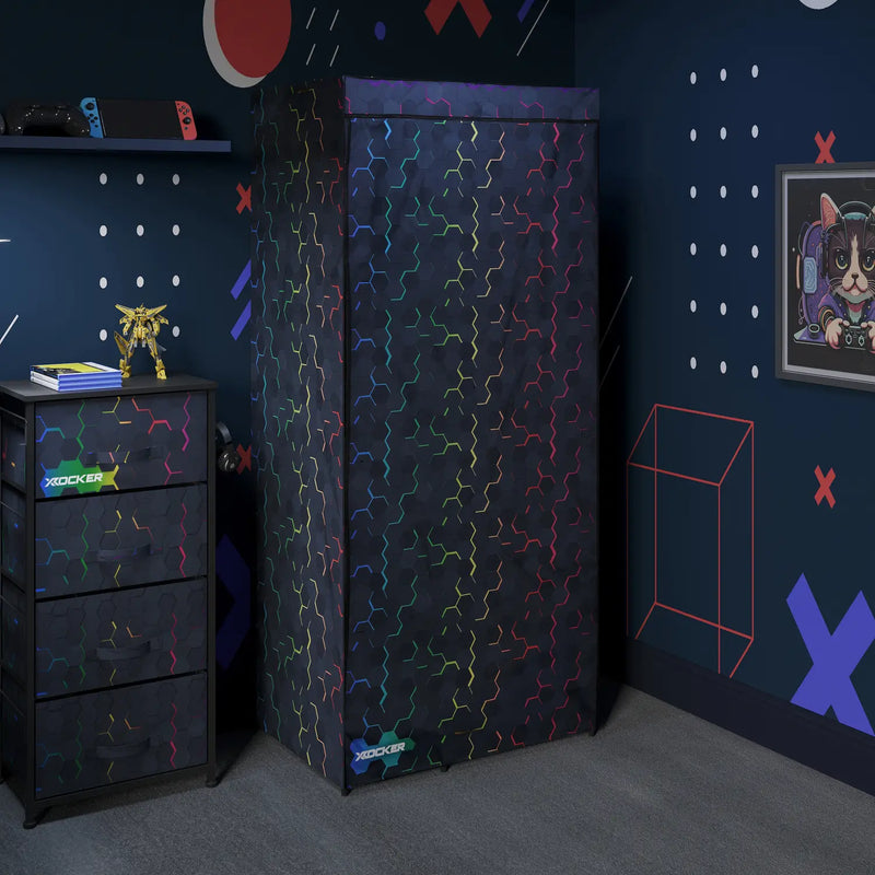 Children's room with a Canvas dark blue wardrobe and dresser featuring colorful patterns.