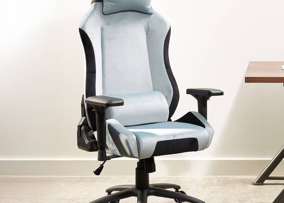 Gray and black office chair with headrest in a room setting.