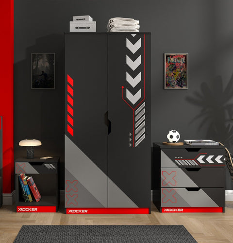 Black and red gaming desk with X rocker branding in a room setting.