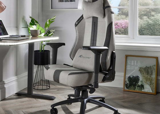 Ergonomic office chair in a home office setting with a desk and decor.