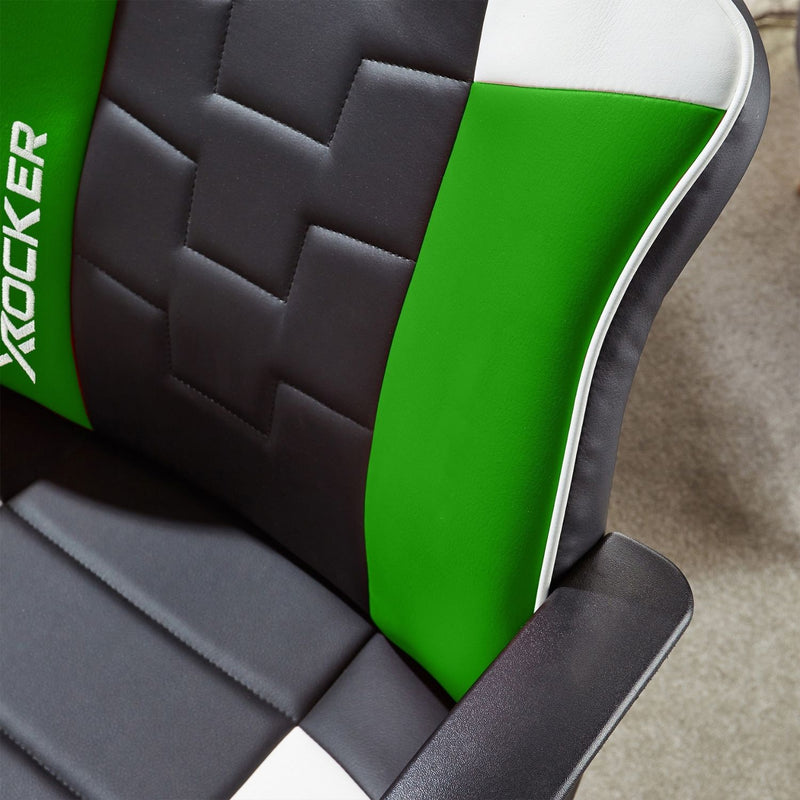 Close-up of a gaming chair with green and black design, featuring the X rocker brand.