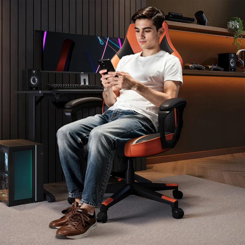 Person sitting on a gaming chair in a room with gaming setup