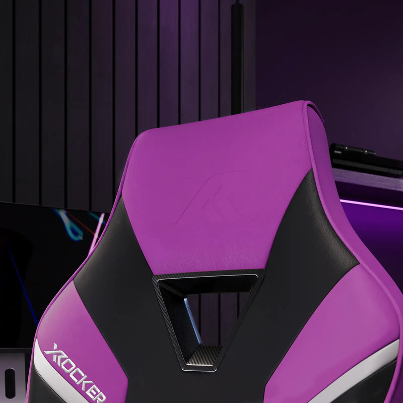 Purple and black gaming chair with X rocker logo on a blurred background