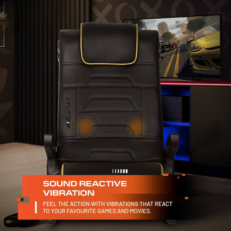 Black gaming chair with sound reactive vibration feature in a gaming setup.