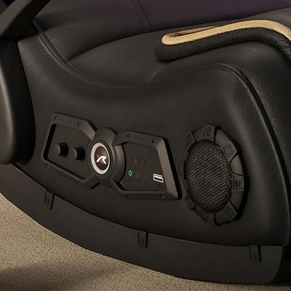 Close-up of a car seat with audio control panel and speaker