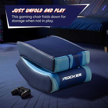 Foldable gaming chair with 'X Rocker' branding on a blue surface, with text about folding for storage.