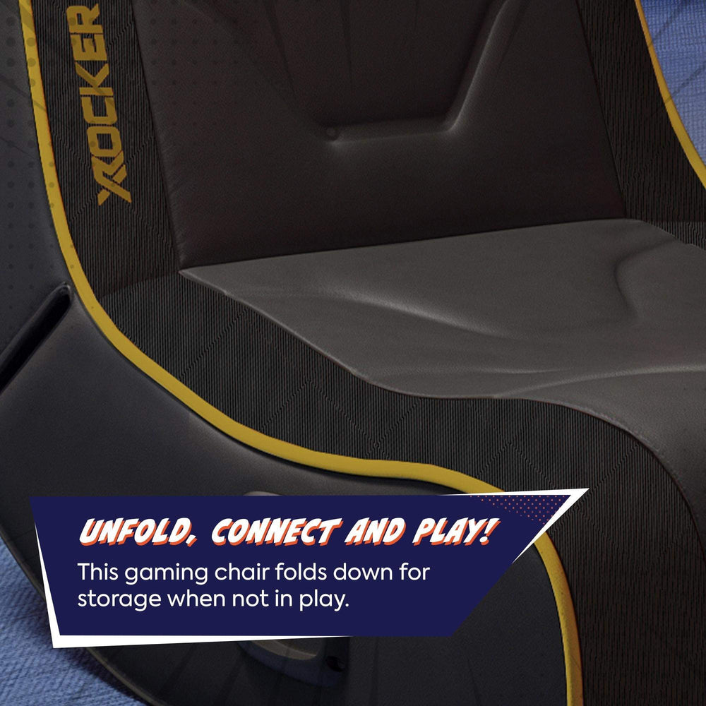 Gaming chair with text indicating it folds down for storage