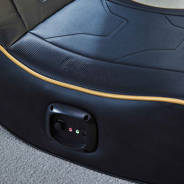 Close-up of a floor rocker with a speaker and control buttons.