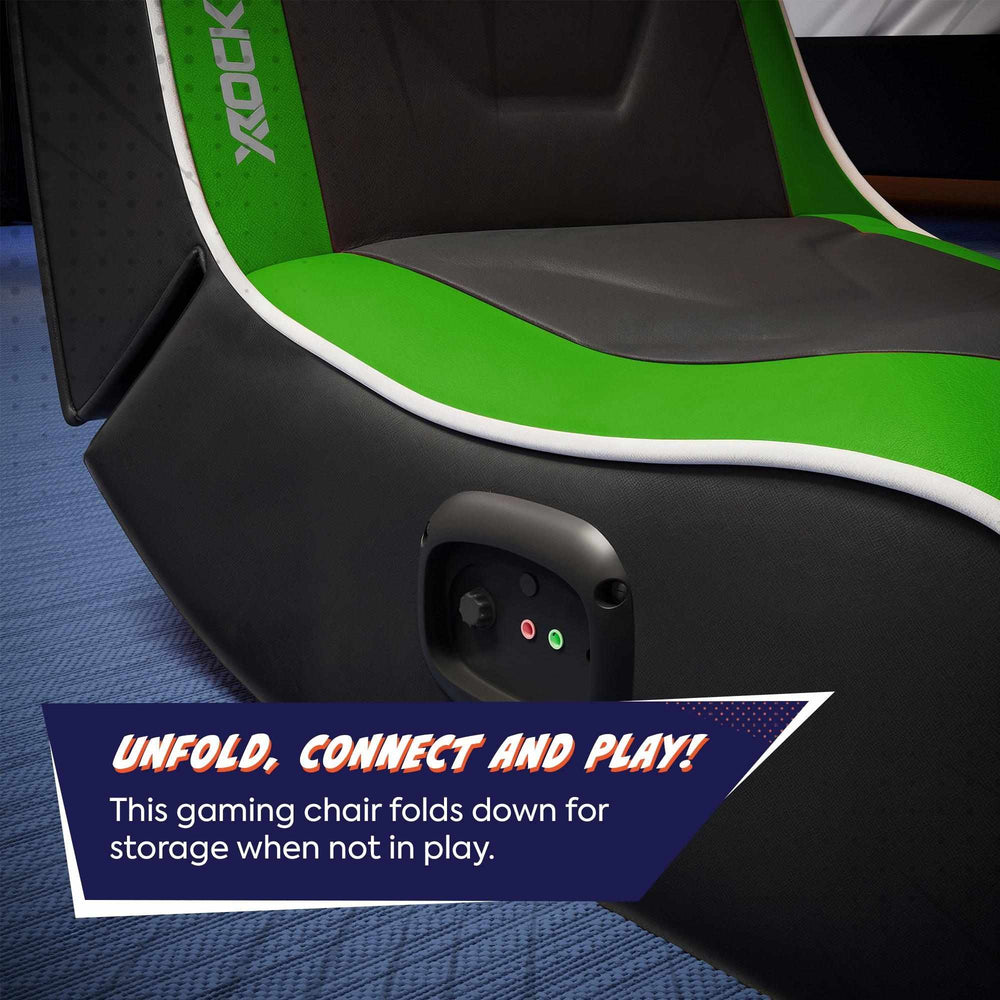 Gaming chair with green and black design, featuring text about folding and connecting for use.