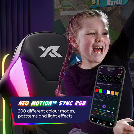 Child using a gaming chair with RGB lighting and smartphone app interface.