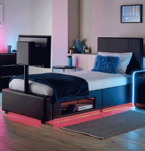 Modern black TV bed with ambient LED lighting and a sleek upholstered design for a stylish bedroom upgrade.