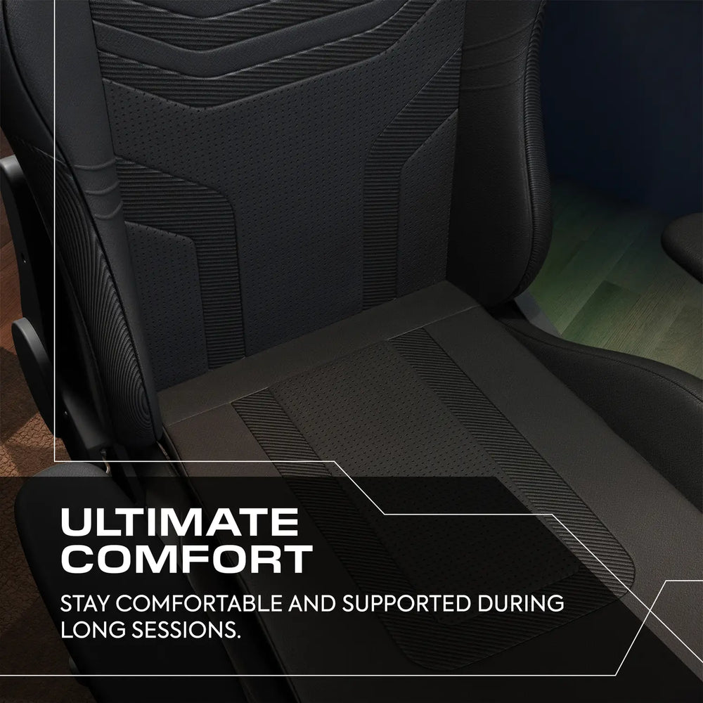 Black ergonomic chair with text 'Ultimate Comfort' on a blurred gaming setup background