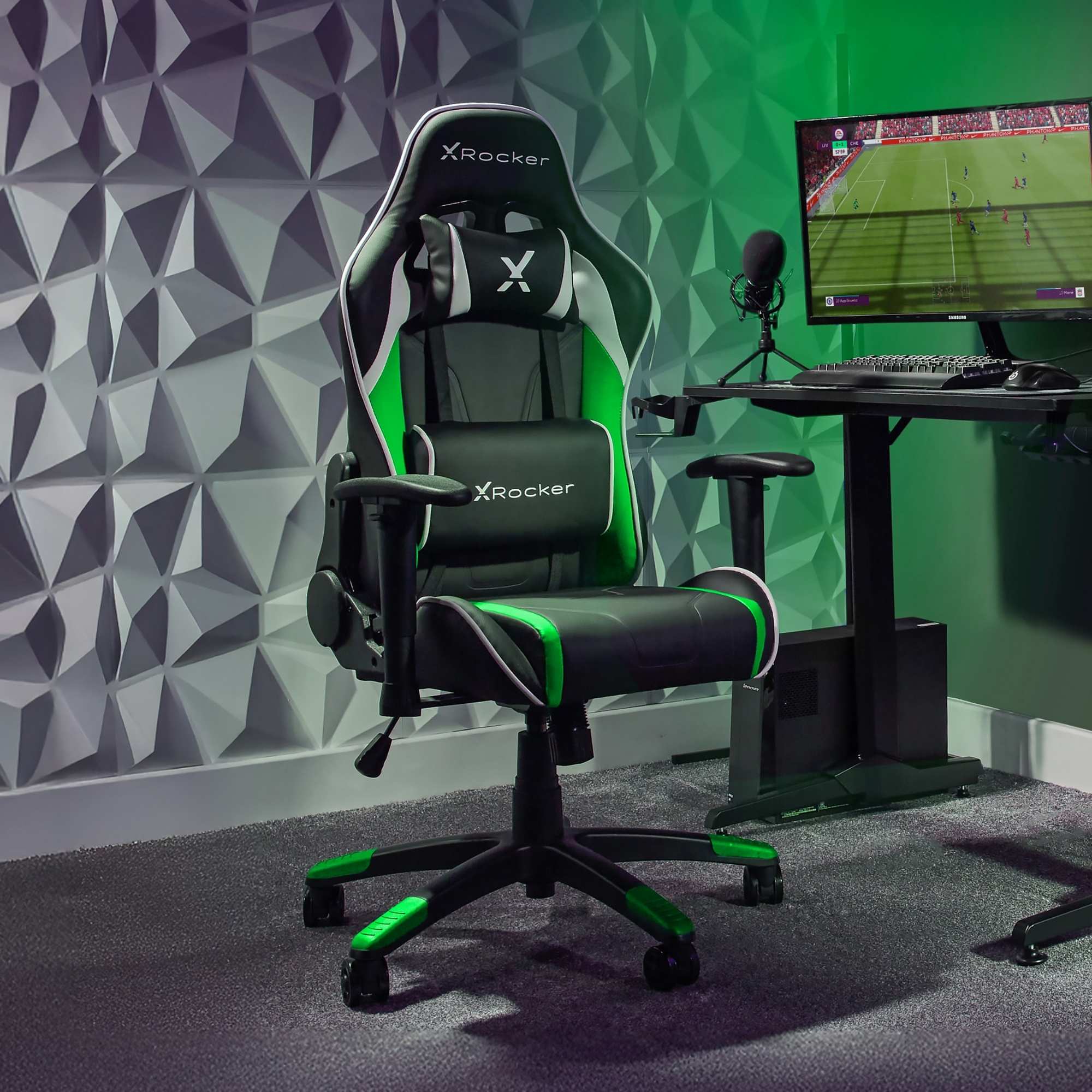 Gaming chair with X rocker branding in a room with a computer setup.