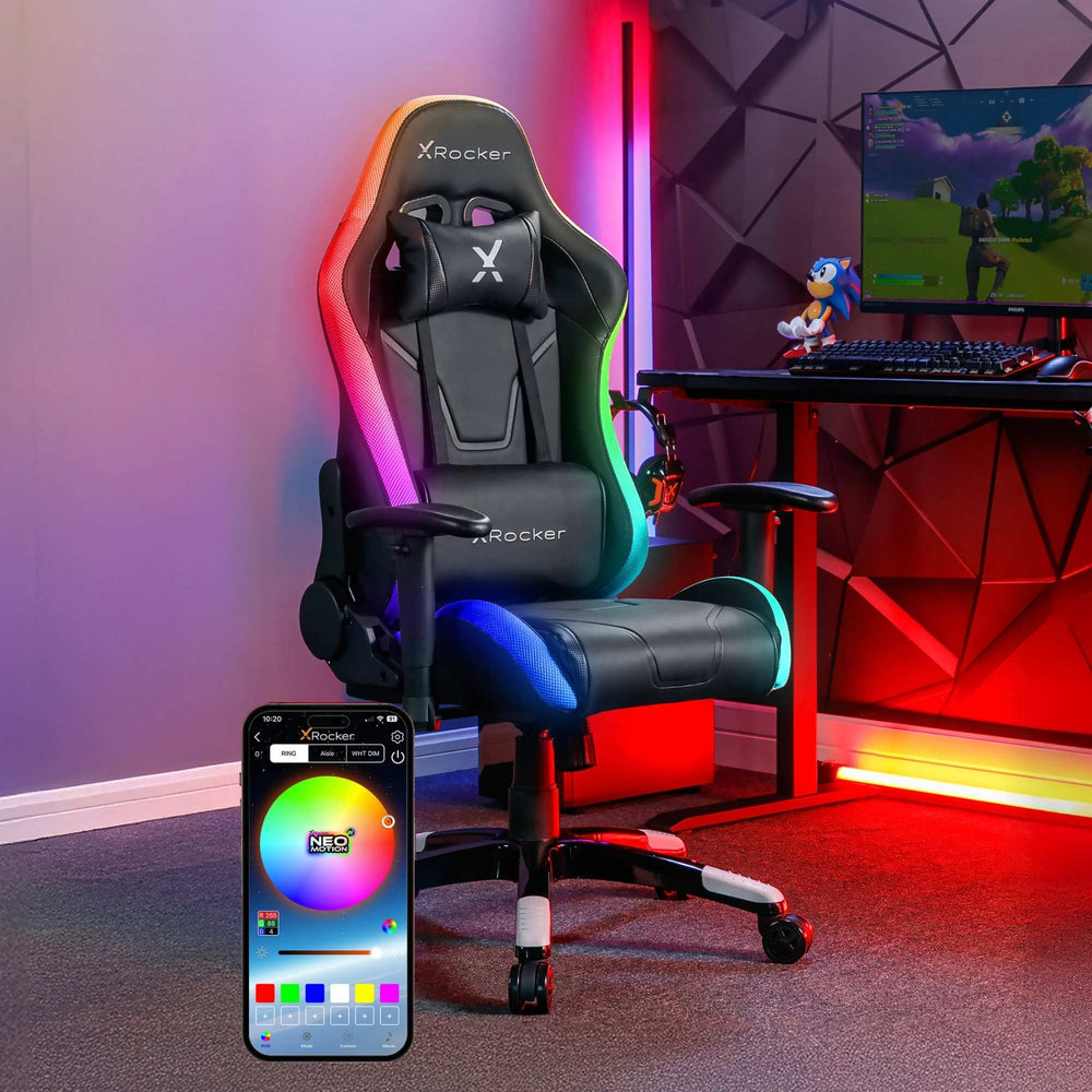 Gaming chair with RGB lighting in a room setup with a computer desk and monitor.