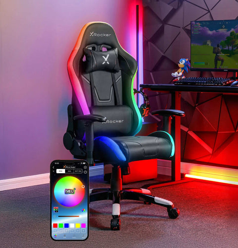 Gaming chair with RGB lighting in a room setup with a computer desk and monitor.
