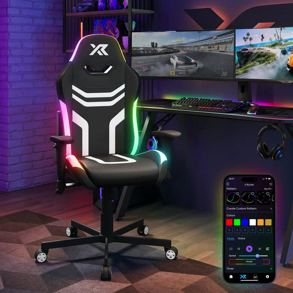 Agility Compact Gaming chair with RGB lighting in a room setup with gaming monitors and accessories.