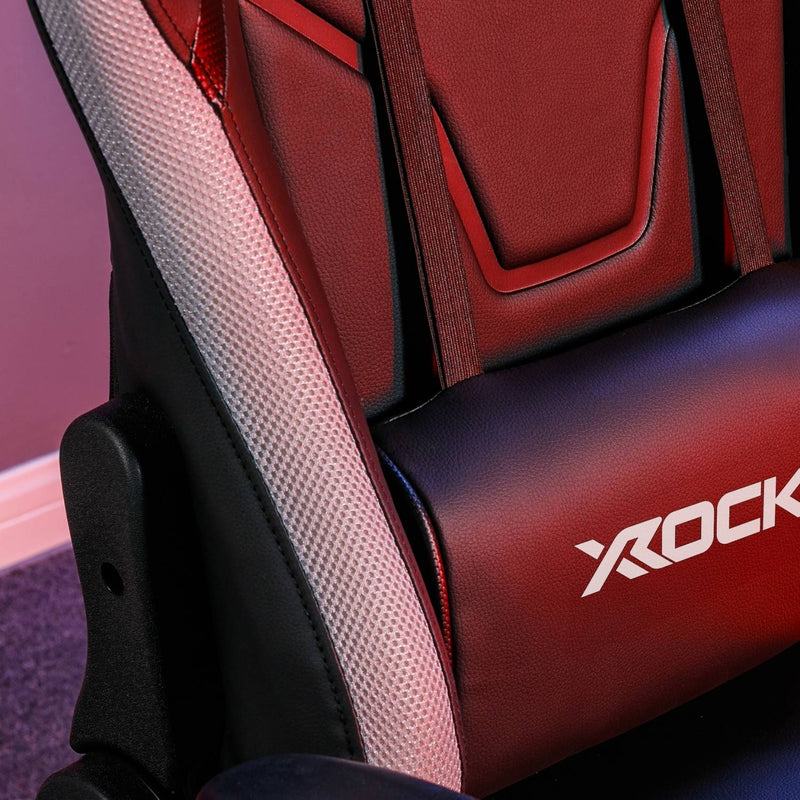 Close-up of a red and black gaming chair with 'X-Rock' branding.