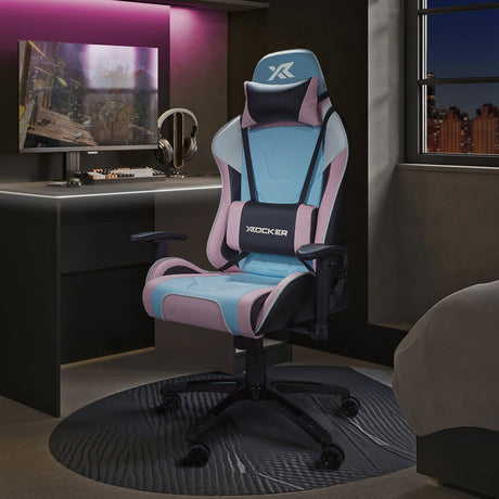 Agility Gaming chair with pink and blue accents in a room setup with a monitor and headphones.