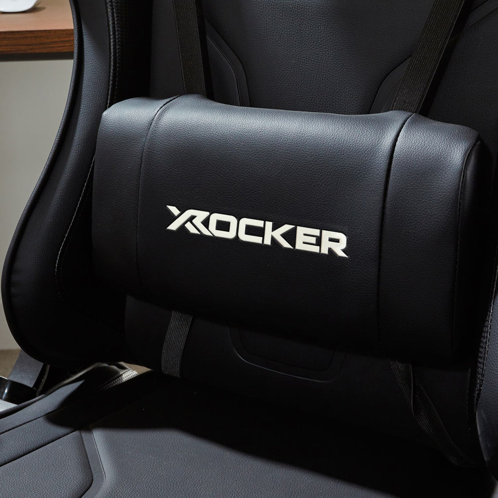 Black gaming chair with 'X-Rocker' logo on the headrest