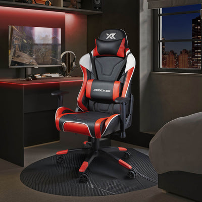 Agility Gaming chair with red accents in a room setup with a desk and monitor.