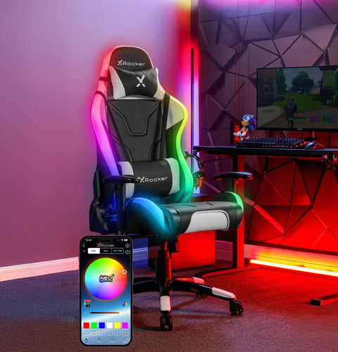 Gaming chair with RGB lighting in a room setup with a computer desk and colorful walls.