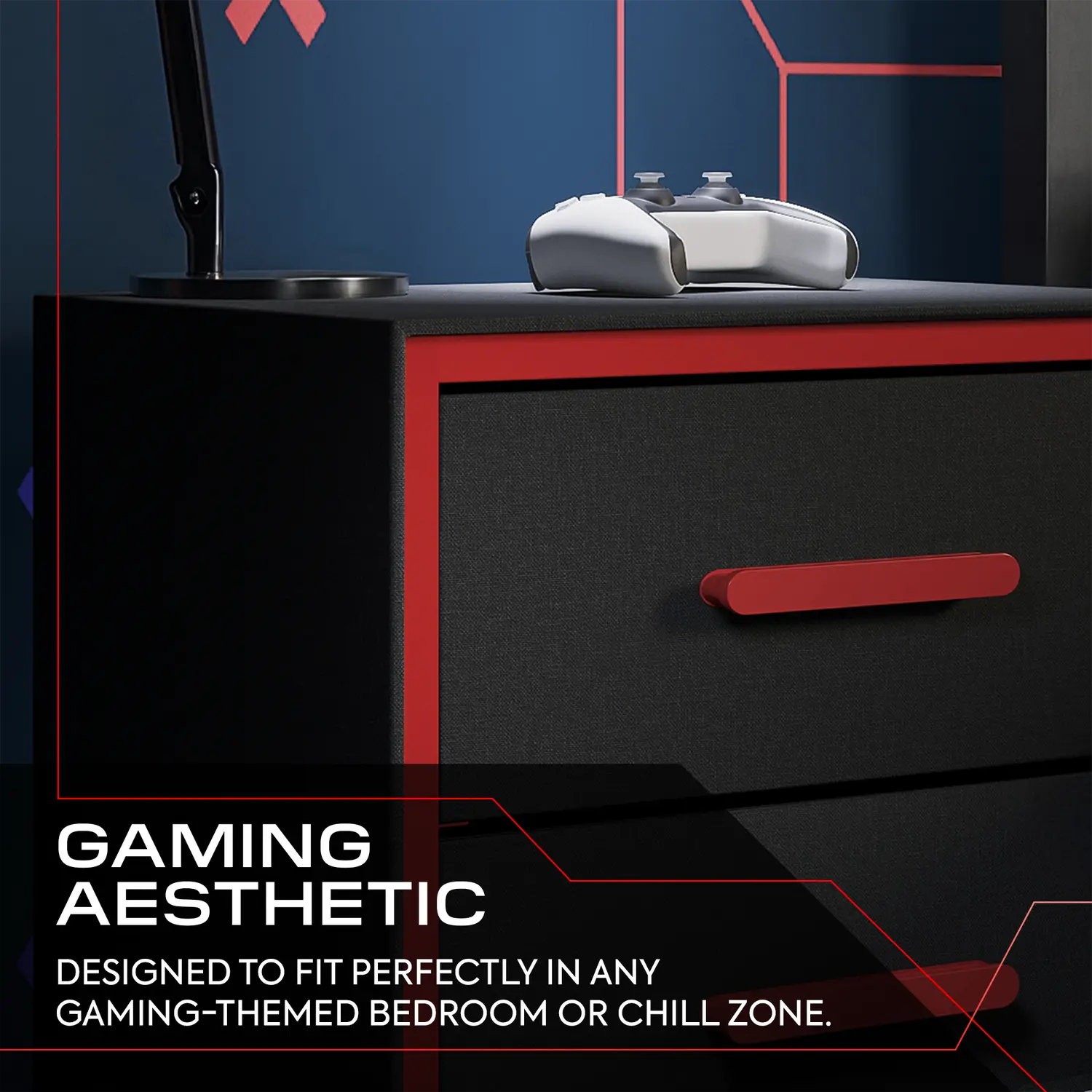 Black and red gaming desk with computer equipment against a dark blue wall.
