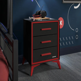 Black and red Arcane three-drawer Chest with gaming accessories against a blue wall.