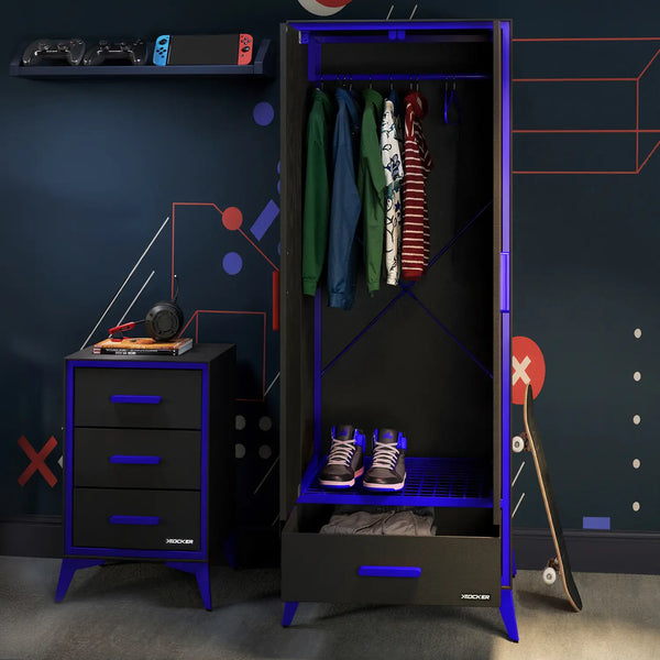 Black wardrobe with open door revealing clothes, next to a black dresser with blue accents in a room with colorful wall designs.