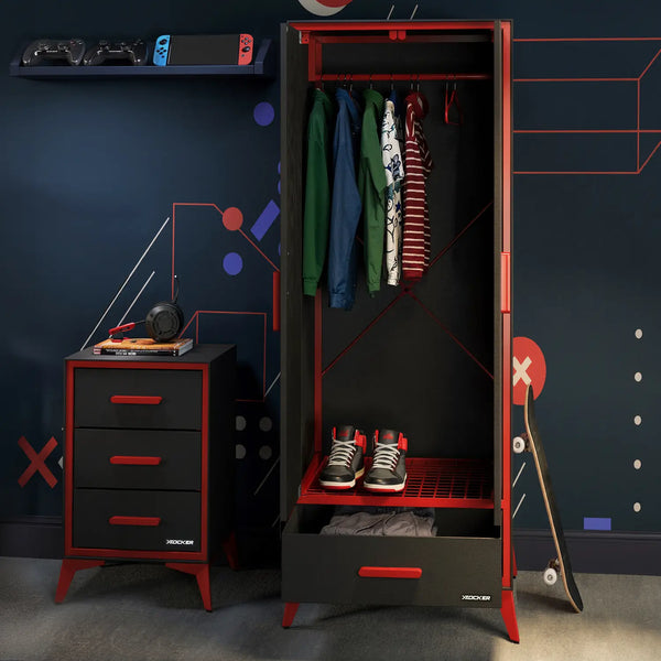 Red and black wardrobe with clothes and shoes in a room with gaming console and furniture.