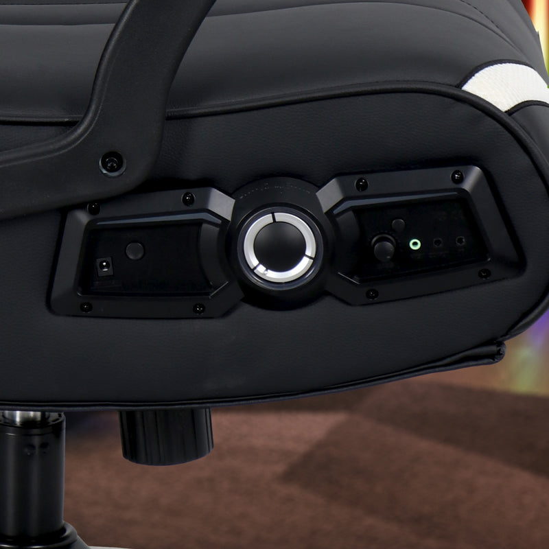 Close-up of a black office chair with control panel and joystick