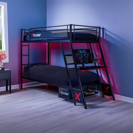 Black metal bunk bed with X rocker branding in a room with blue walls and a desk.