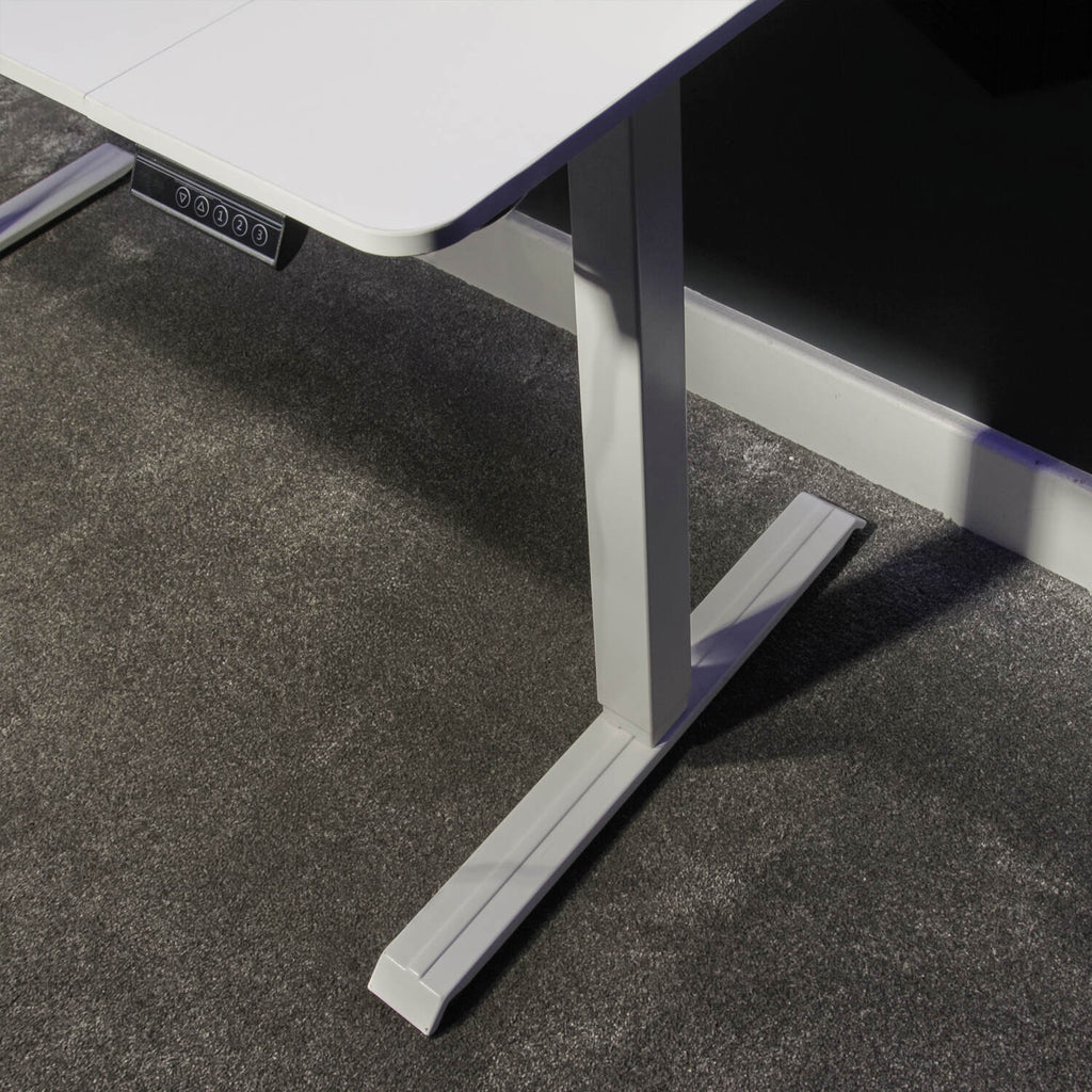 Compact standing desk in white for remote work setup