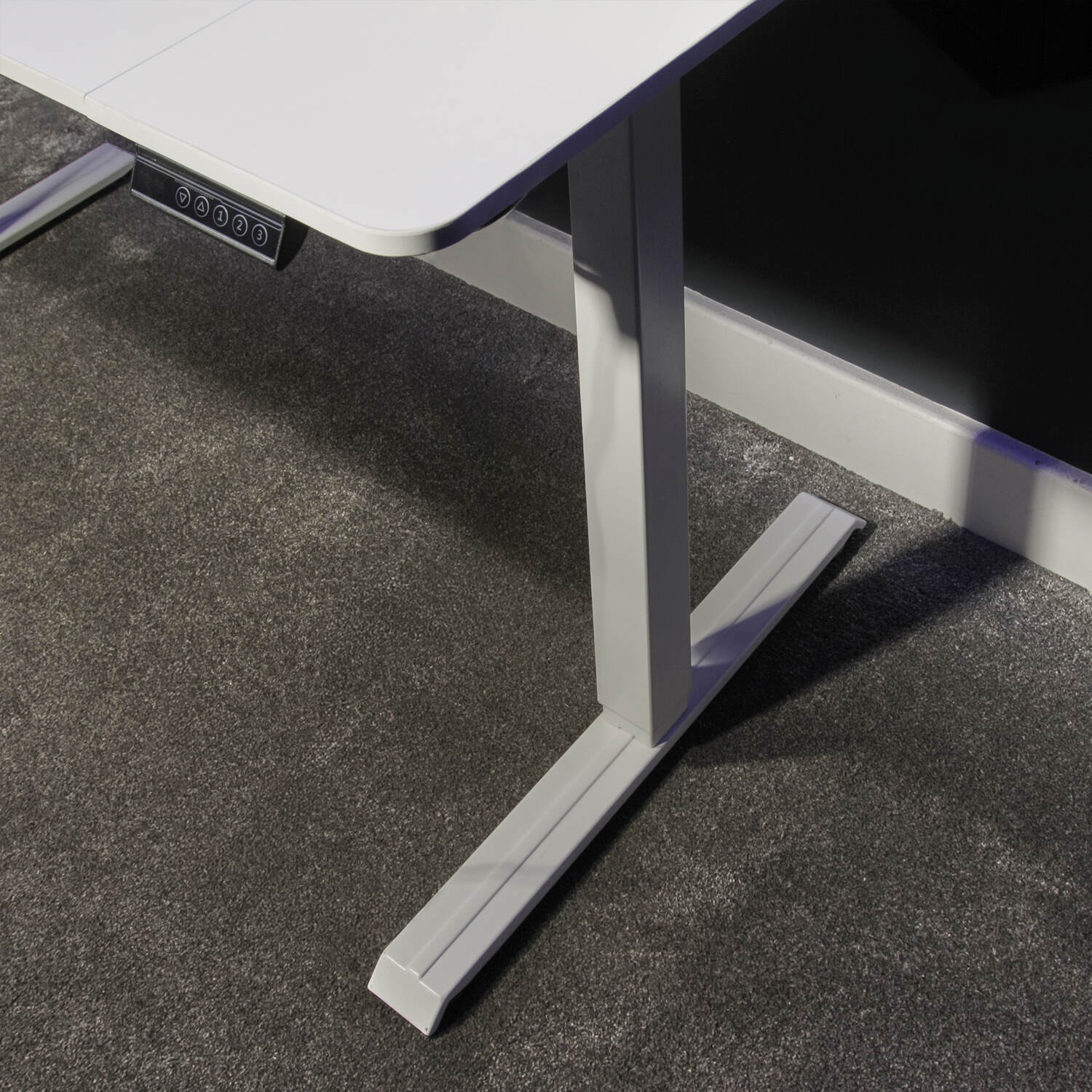 Compact standing desk in white for remote work setup