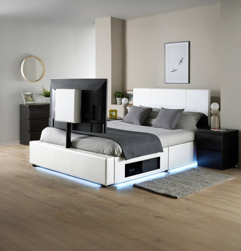 Modern bedroom with a white bed and LED lighting