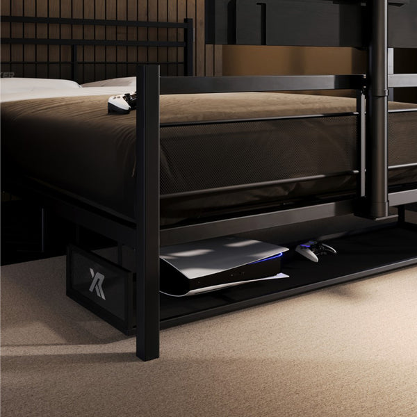 Black metal bed frame with storage drawers in a bedroom setting.
