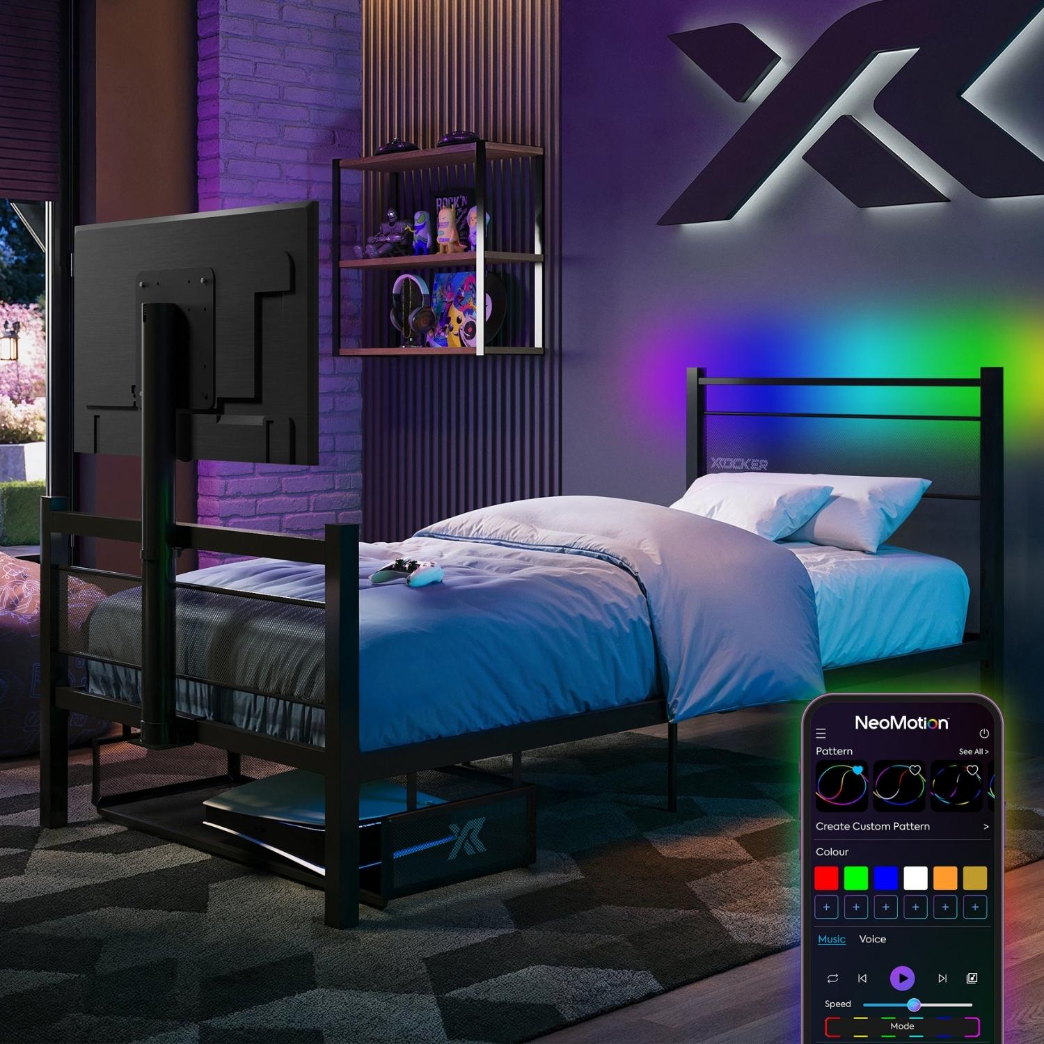 Bedroom with a Black TV Bed, the Basecamp RGB - featuring a remote control with LED lighting options.