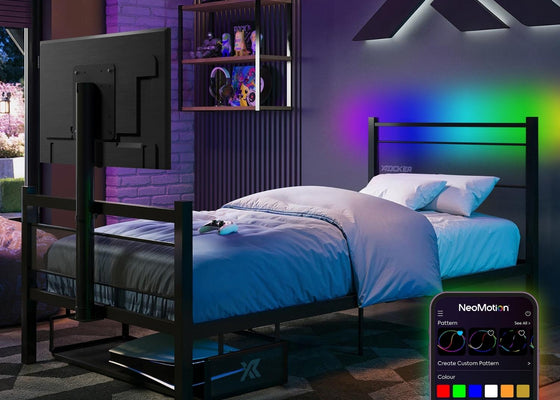 Bedroom with a Black TV Bed, the Basecamp RGB - featuring a remote control with LED lighting options.