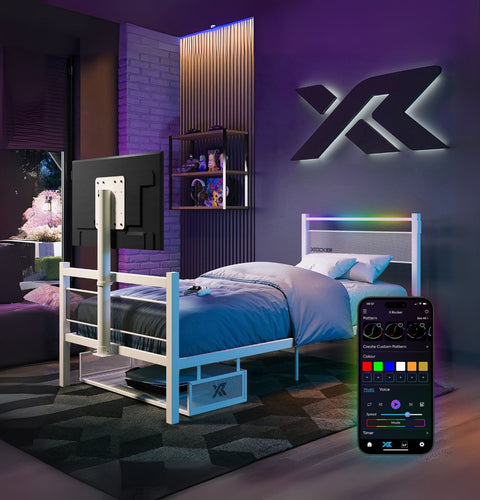 Modern bedroom with a bed and smart TV, featuring a smartphone app for control.