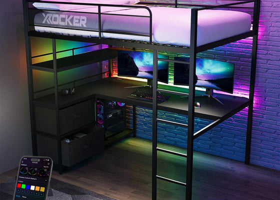 Gaming room setup with a loft bed, desk, and RGB lighting effects.