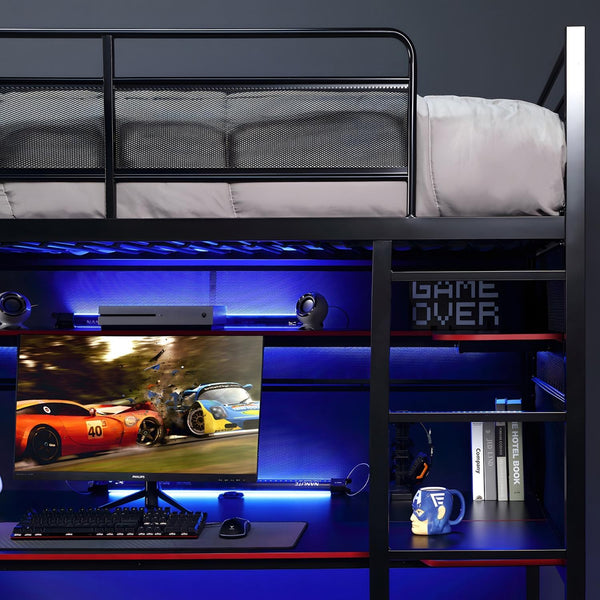 Bunk bed with gaming setup including a monitor, keyboard, and mouse on a desk.
