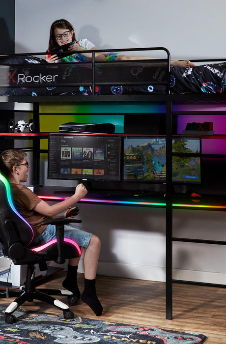 X Rocker Battlebunk RGB – a space-saving gaming bed with a built-in desk, multi-monitor setup, and LED lighting effects.