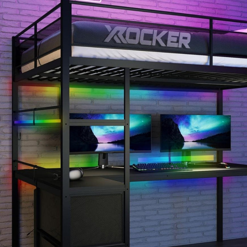 Gaming setup with a 'Rocker' bunk bed against a brick wall.